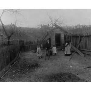  1899 photo African American family standing in a yard in 