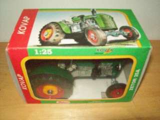 New KOVAP   ZETOR 25A Toy Tin Tractor Mechanical Windup, with key.