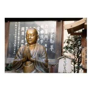  Praying statue of Buddha in Asakusa Kannon Temple Poster 