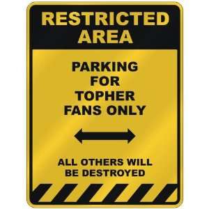  RESTRICTED AREA  PARKING FOR TOPHER FANS ONLY  PARKING 