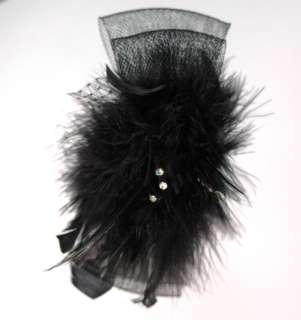 motive size 7 * 4 material  feather main color  black hand 