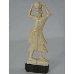    African art Ivory Carving of Man with pot on head