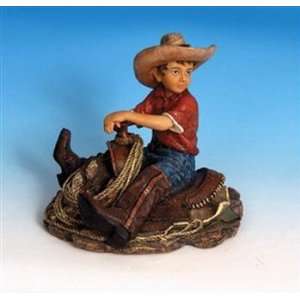  Cowboy kid on a saddle statue
