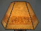 spanish revival sheild w/ lions goatskin lamp shade