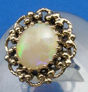66 ct Opal, 14k Yellow Gold Ring, Broadflash fire  