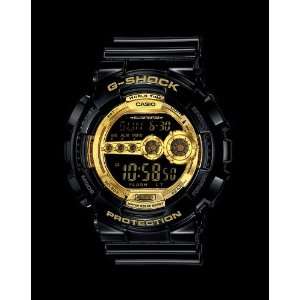  G Shock   Mens GD100GB Classic Xlarge Watch in Black/Gold 