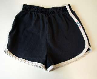 super faded black short shorts have elastic waist and are