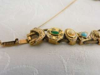   unmarked Goldette slide bracelet 14 charm Victorian revival gold tone