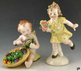   German Porcelain Figurines Cupid & Young Girl w/ Flowers c. 1920 30