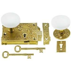 Reproduction Doorknob. Brass Ornate Rim Lock Set With White Porcelain 