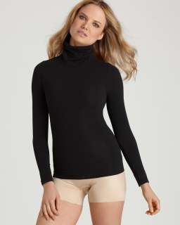   turtleneck style with fabulous figure shaping powers from spanx