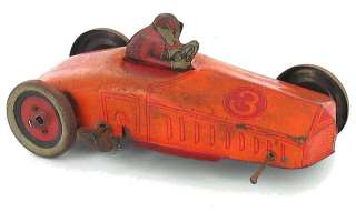 TWO ANTIQUE TIN TOYS DUMP TRUCK WIND UP RACE CAR J. CHEIN  
